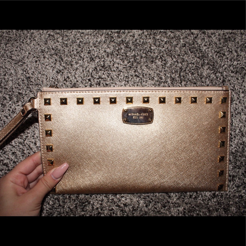 Michael Kors gold clutch/wristlet